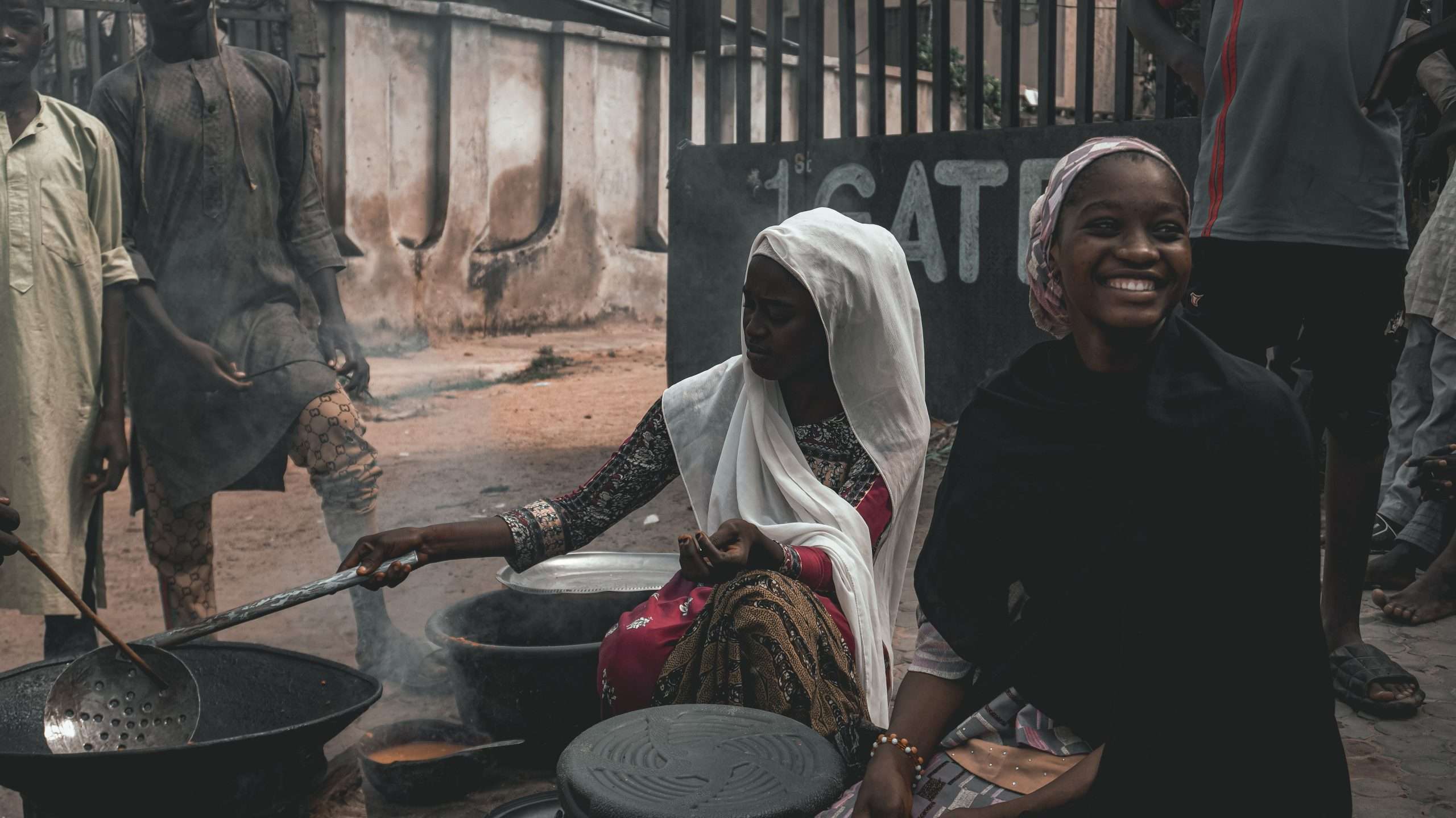 Women cooking at an outdoor market